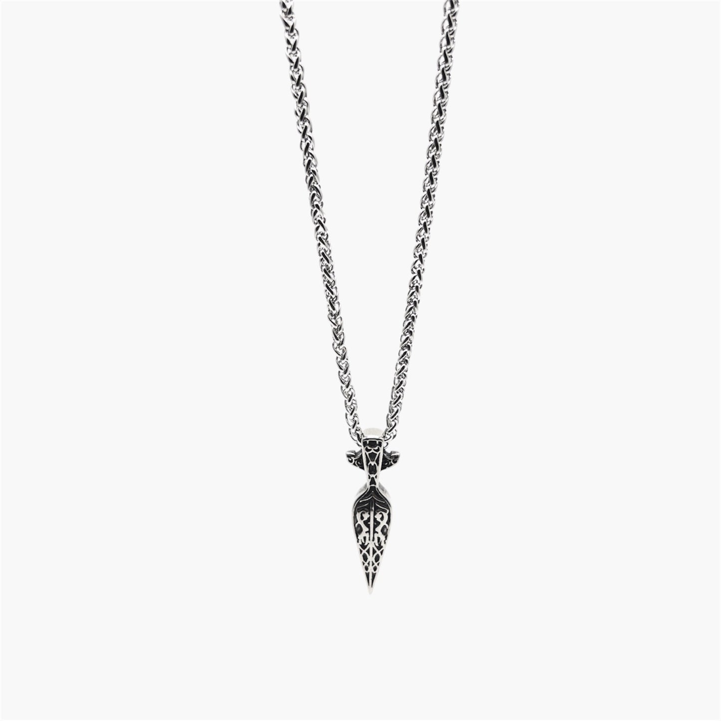 Back view of Spear of God pendant showing detailed craftsmanship