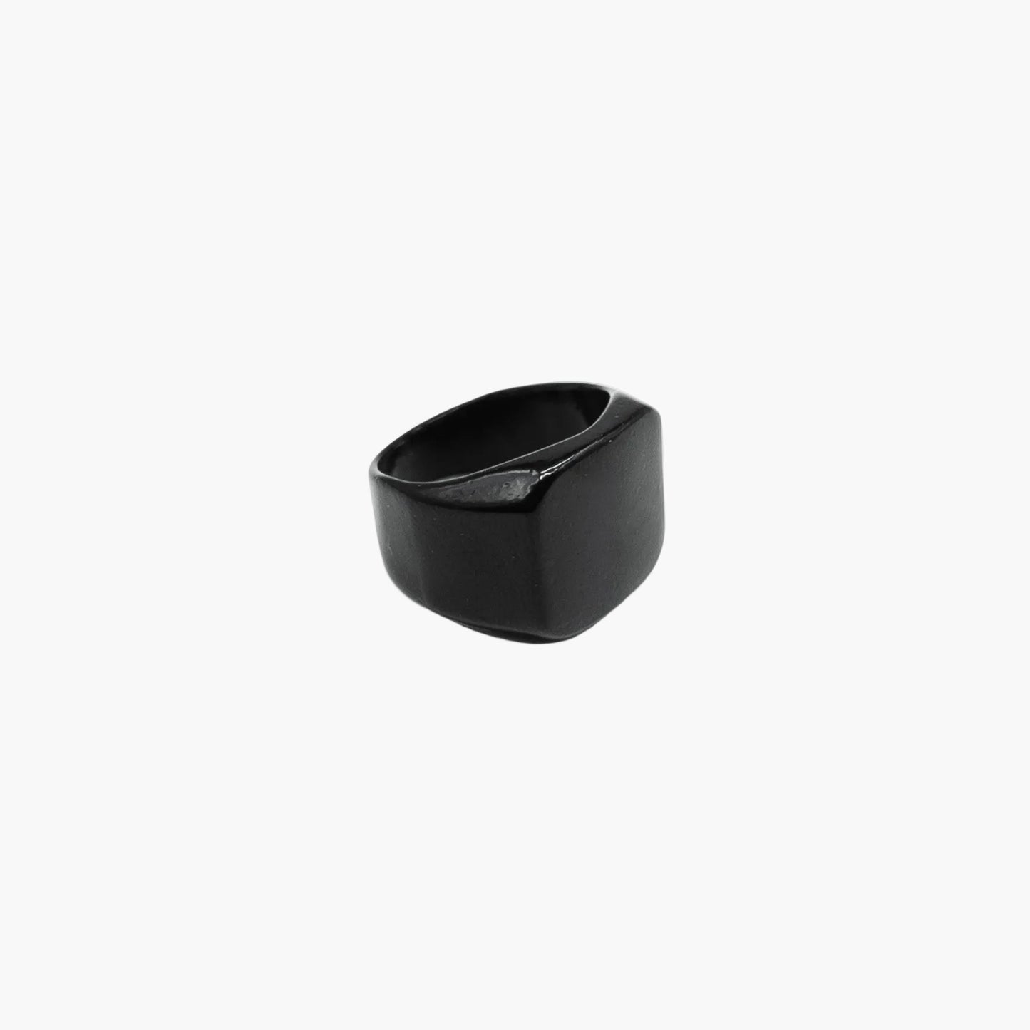 Side profile of black ceramic ring highlighting smooth edges and clean lines.