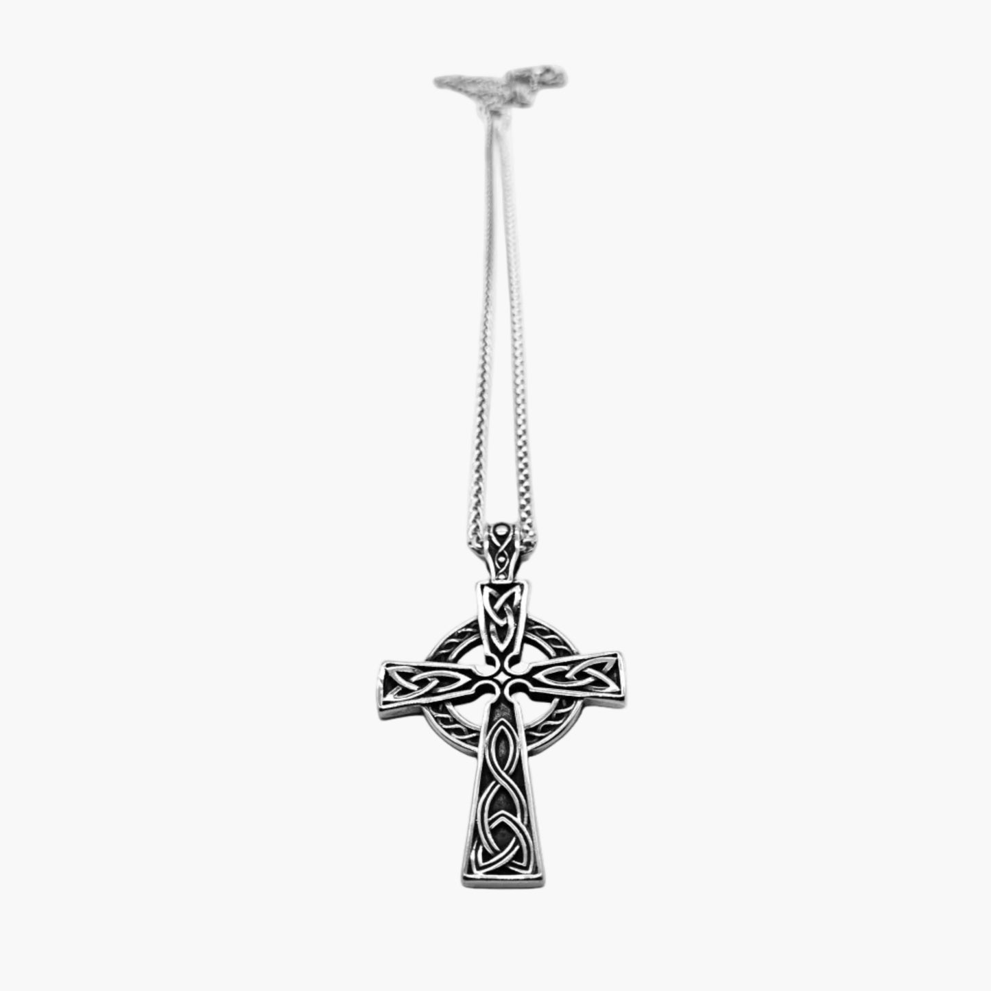 norse cross pendant necklace laid flat with chain
