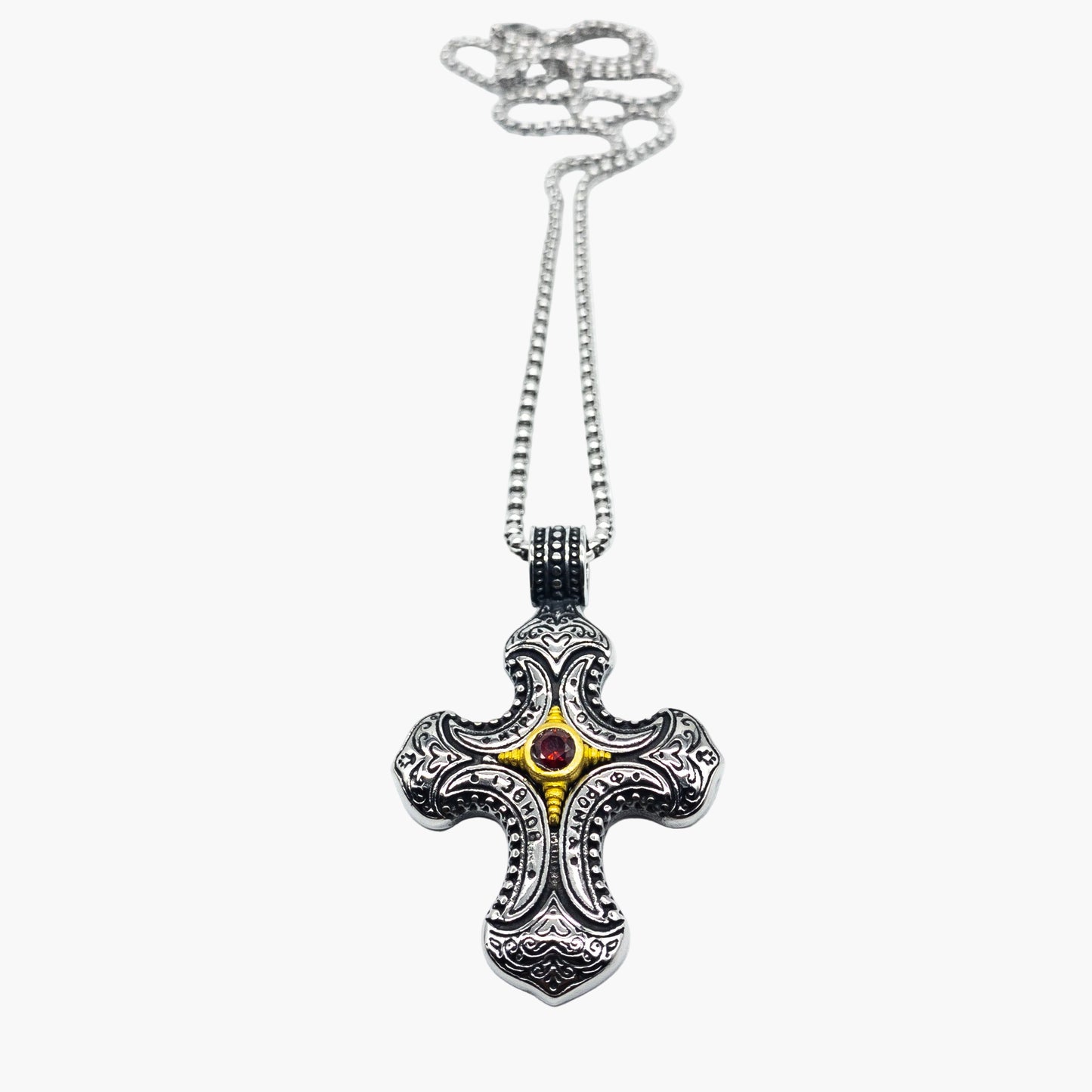 red gemstone centre detail on sculpted cross stainless steel pendant