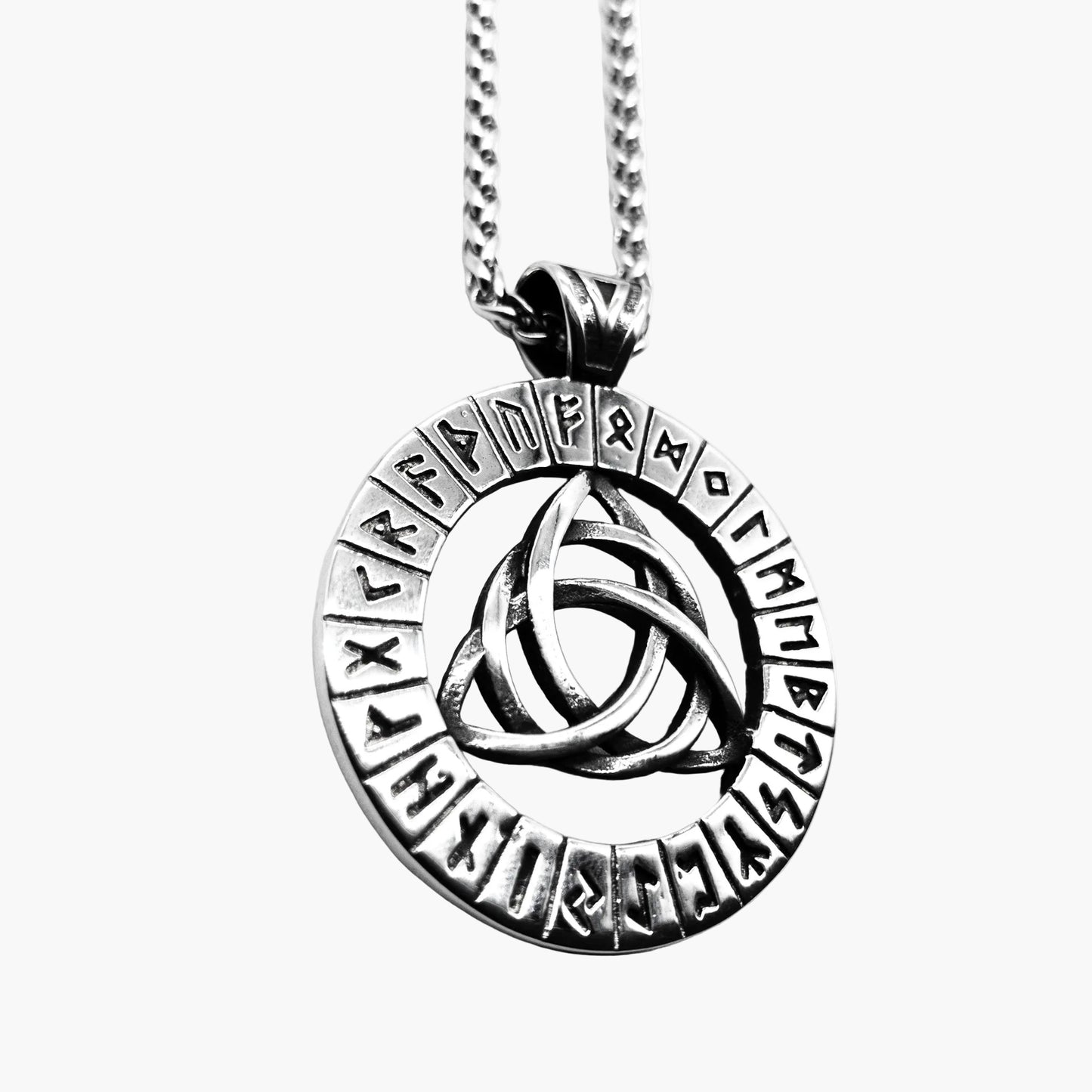 right shot close-up of Norse-Gael Necklace highlighting rune engraved Triquetra pendant and precise etchings
