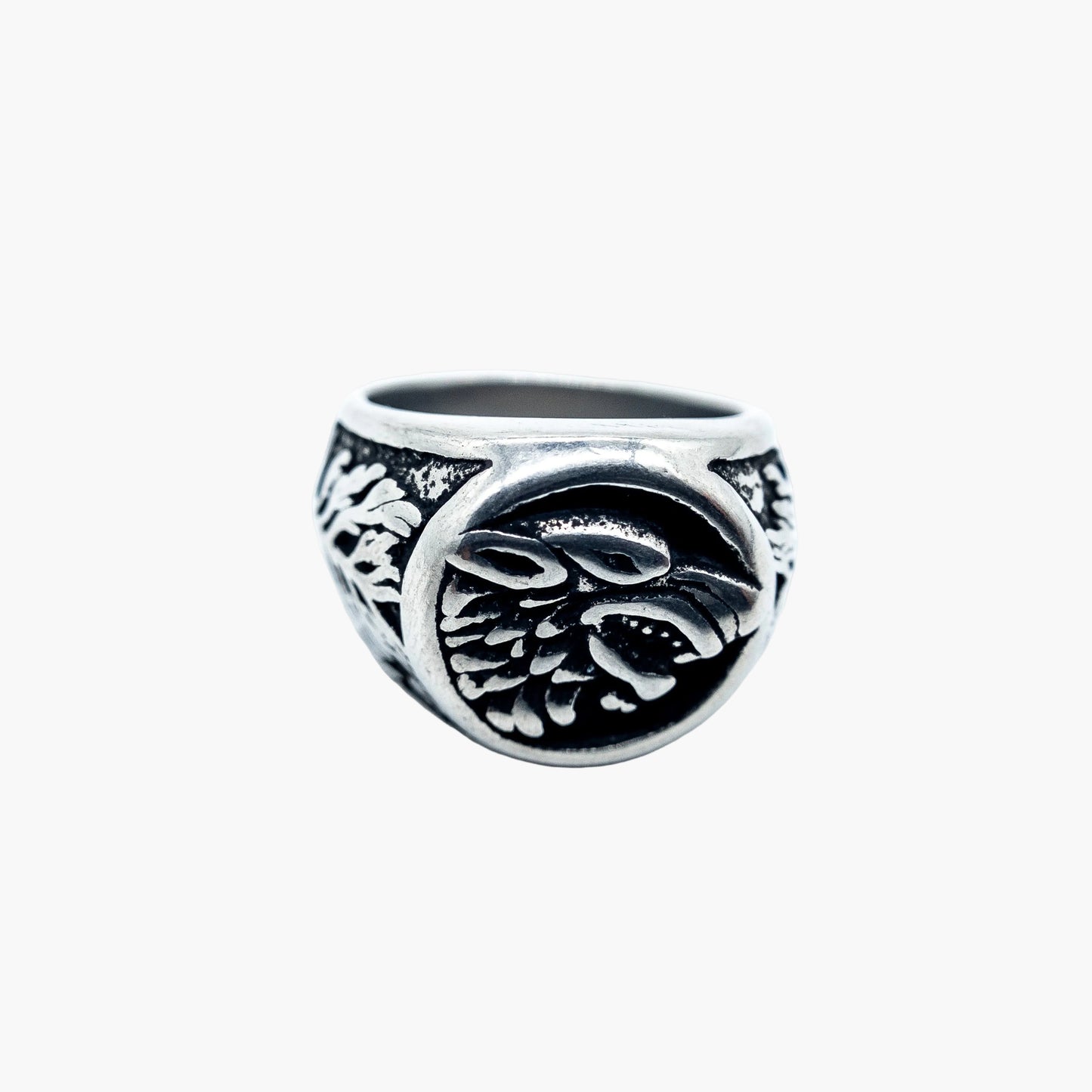 wolf engraving detail on face of Skoll stainless steel ring closeup