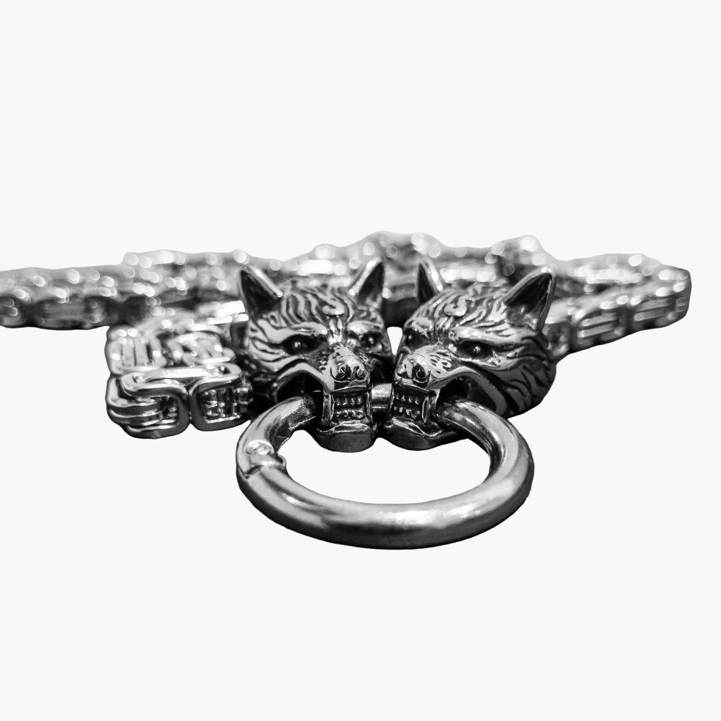 dual wolf head detail on Two Wolves stainless steel chain
