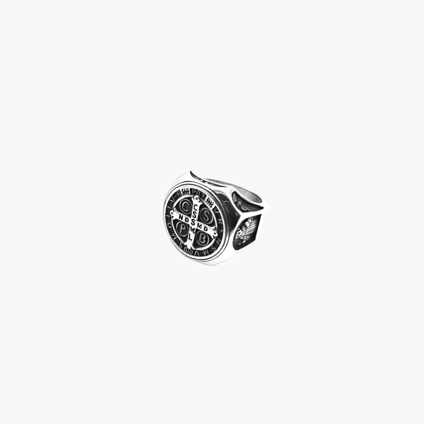 left angle view of Crucifix Amulet ring showing etched band detail