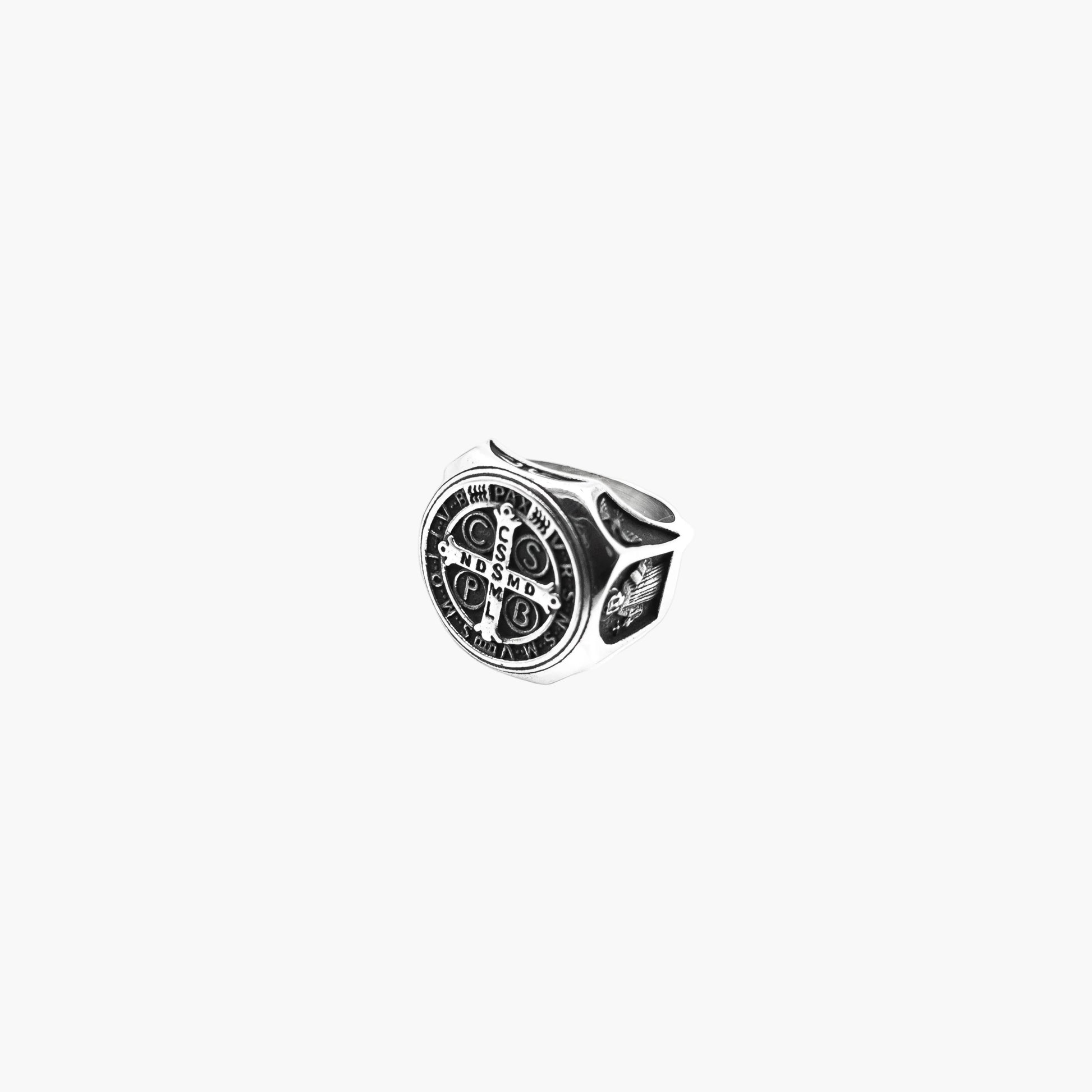 left angle view of Crucifix Amulet ring showing etched band detail