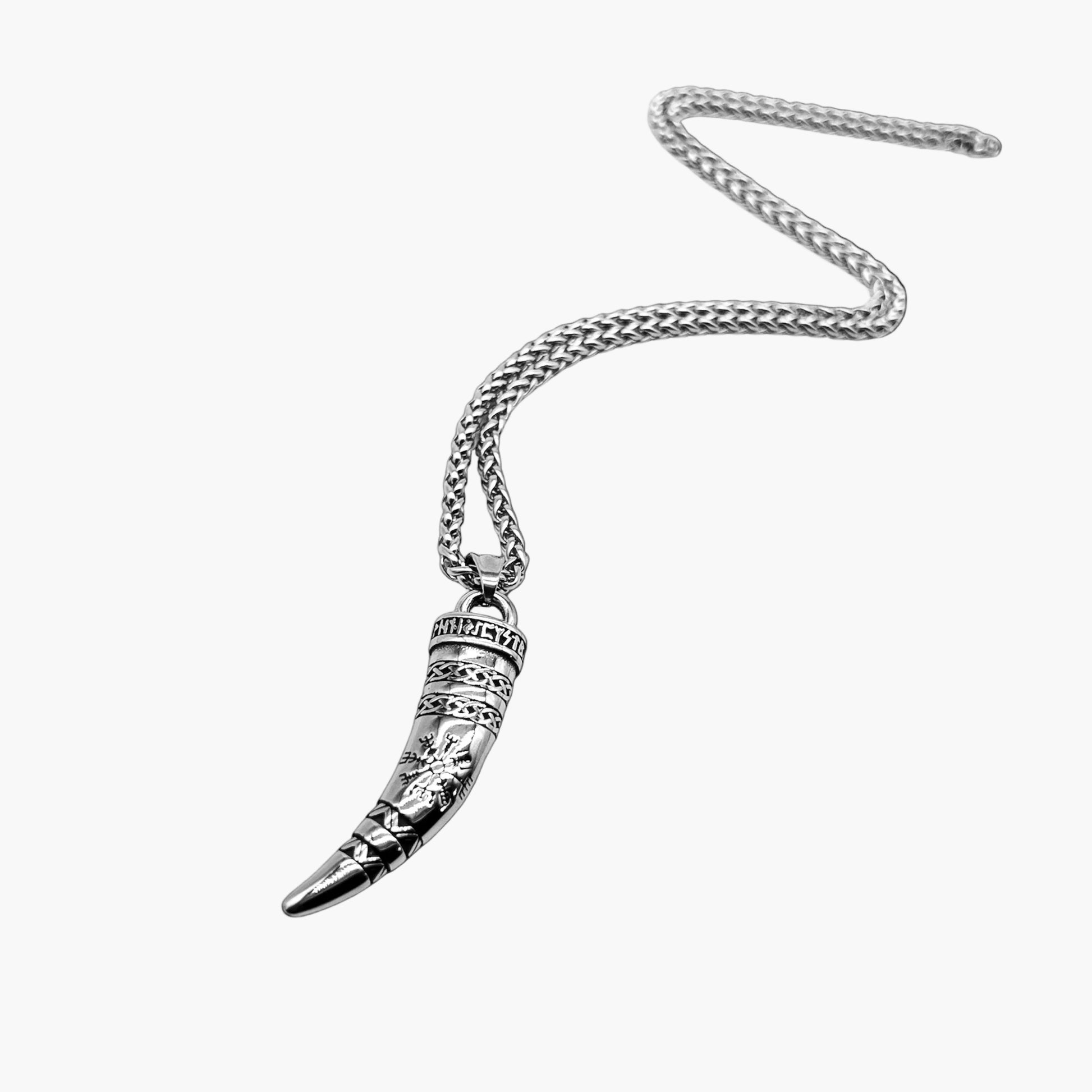 left angle view of Horn of God pendant in 316L stainless steel