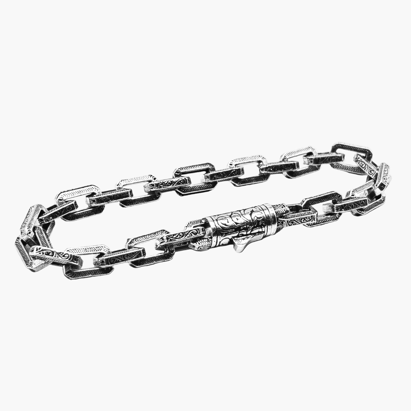 Angled left view of Legacy Bracelet highlighting detailed warrior tribal pattern and polished stainless steel finish.
