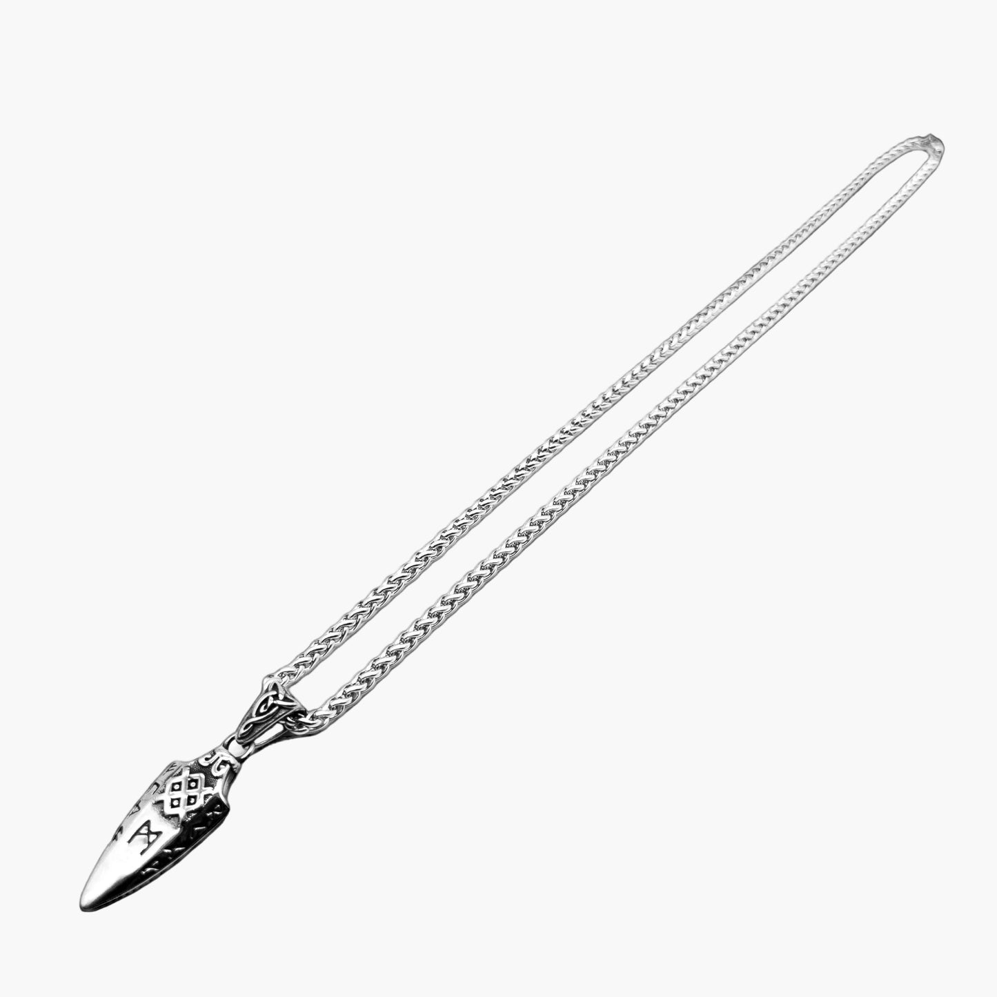 front view of Sovereign Spear pendant highlighting engraved runic details and polished finish
