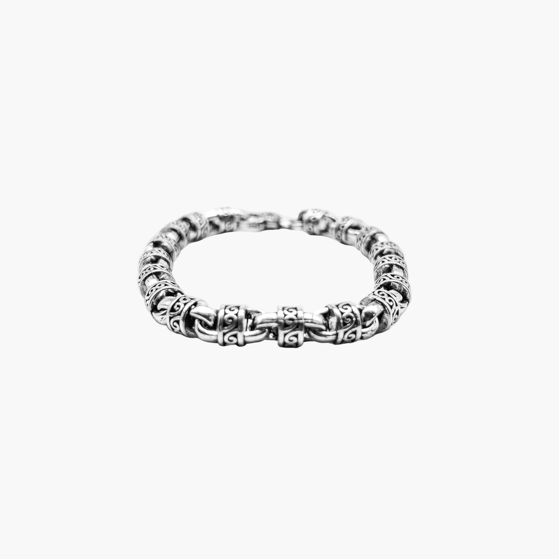 Front shot tribal Bracelet by HOUSE OF ROK, front view showing polished links with intricate Celtic patterns.