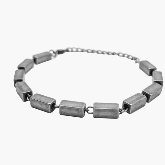 Urban X Bracelet by HOUSE OF ROK, front view showing polished links and modern geometric design