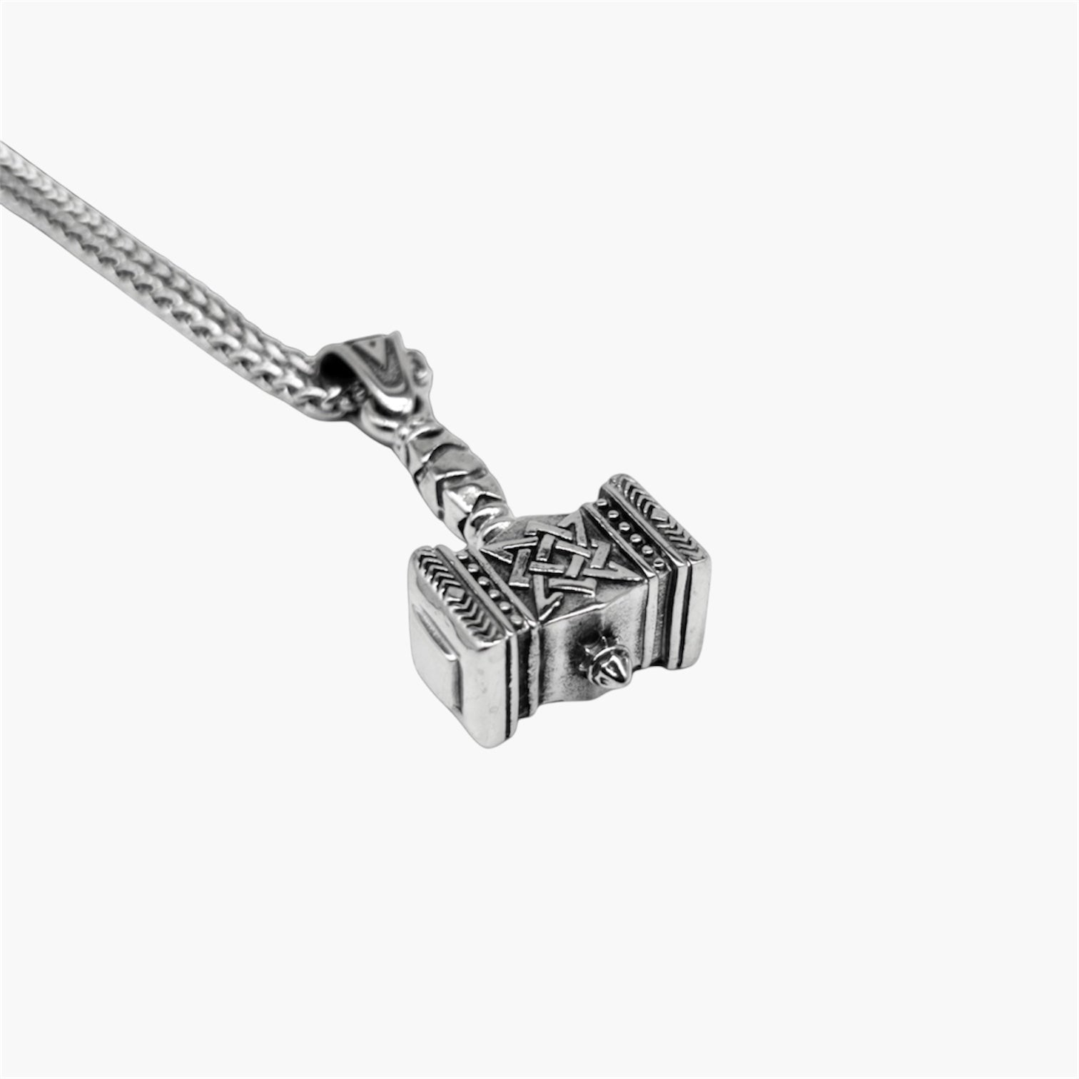war hammer pendant close-up with rune engraving