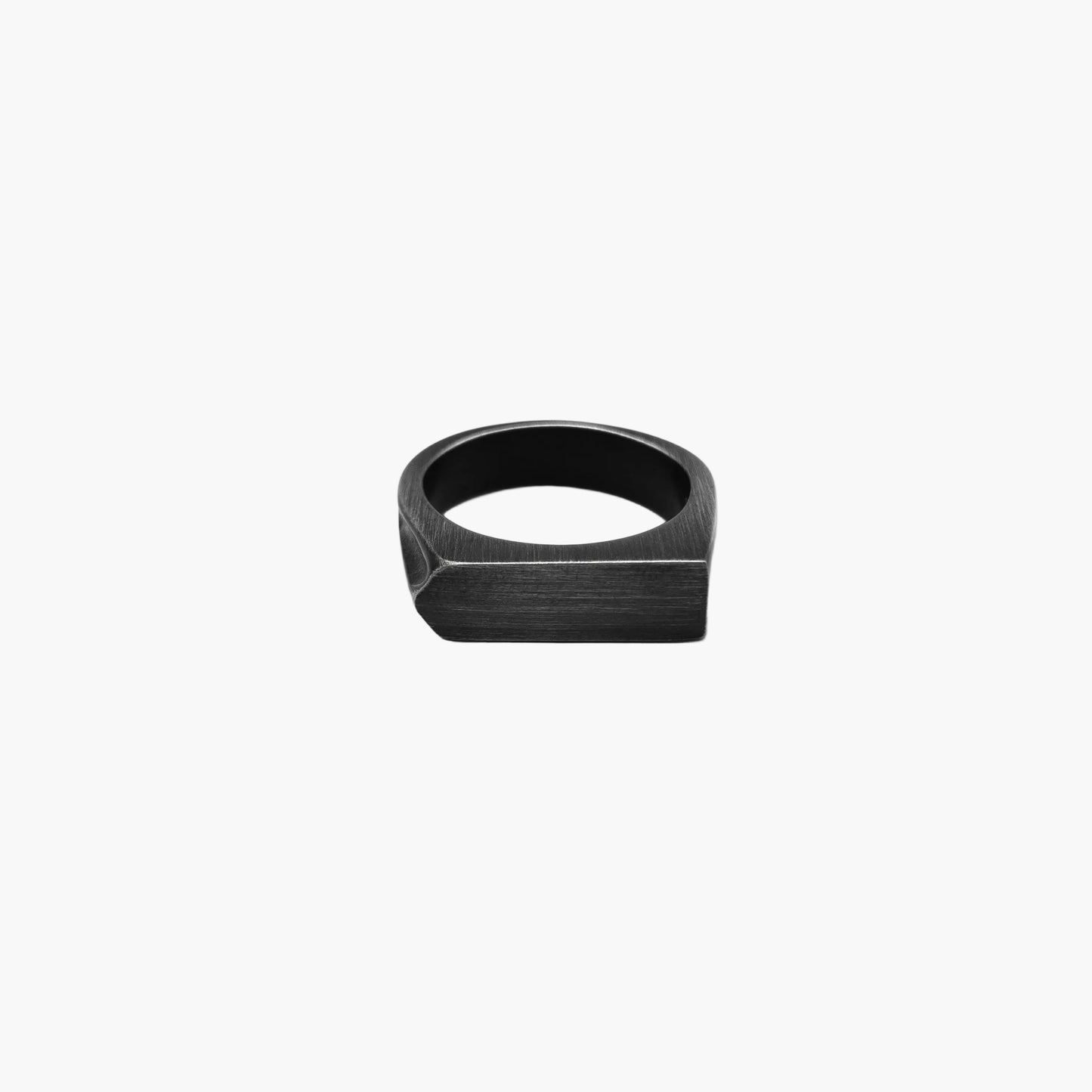 Blacksmith Ring front-facing shot highlighting hammered metal surface