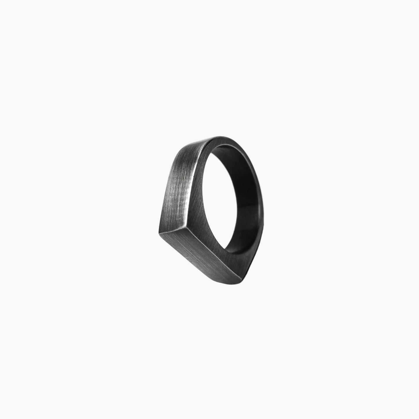 Flat side view shot of Blacksmith Ring highlighting forged metal texture.