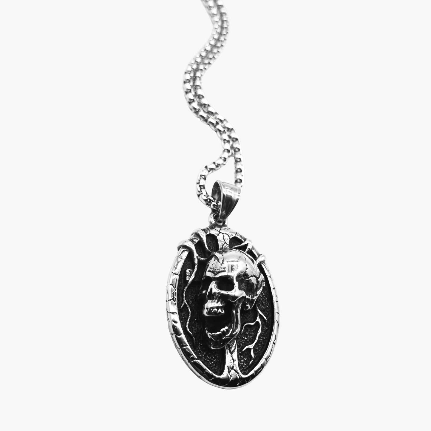right angle view of Death Skull pendant with detachable chain