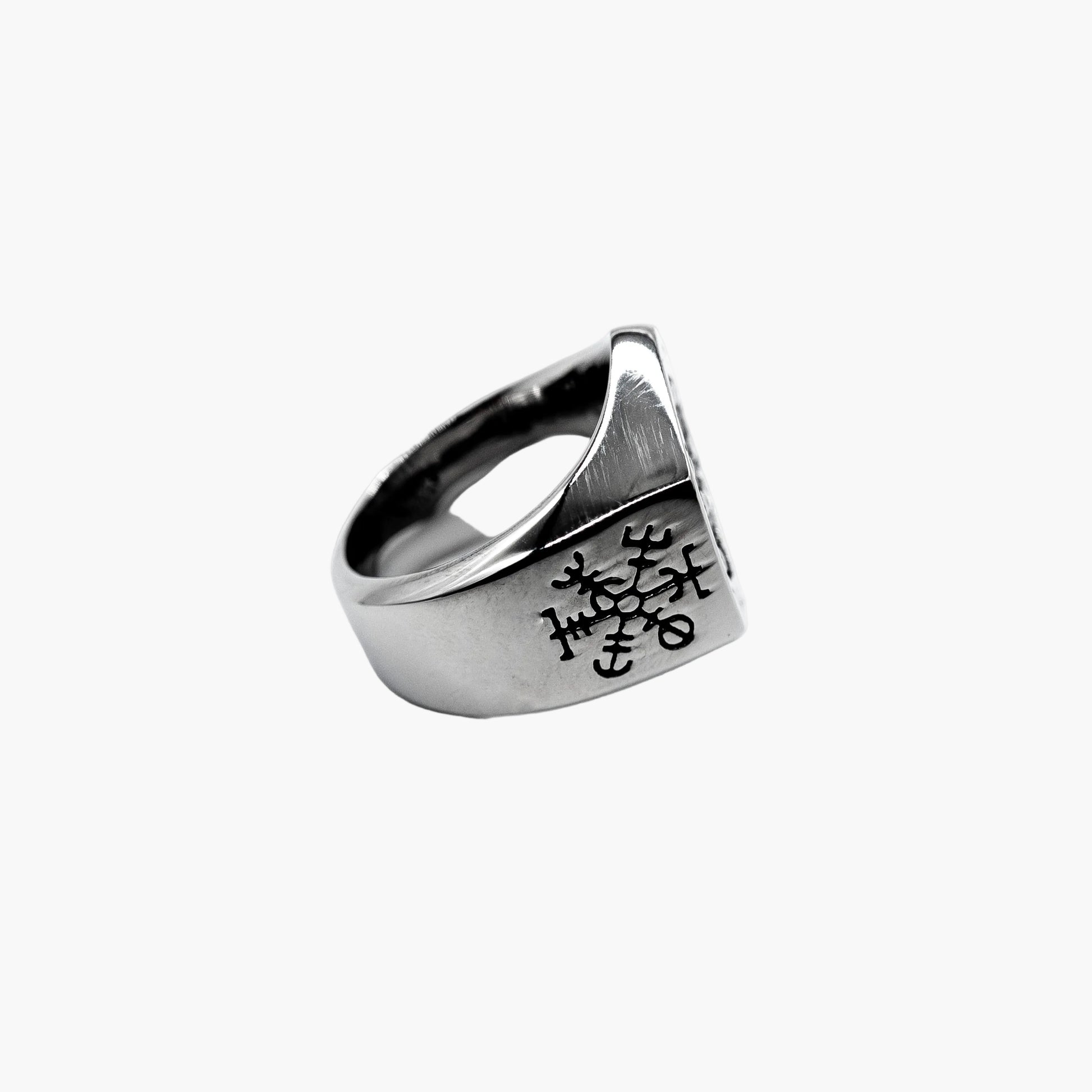 Decoded Norse rune stainless steel ring side shot.