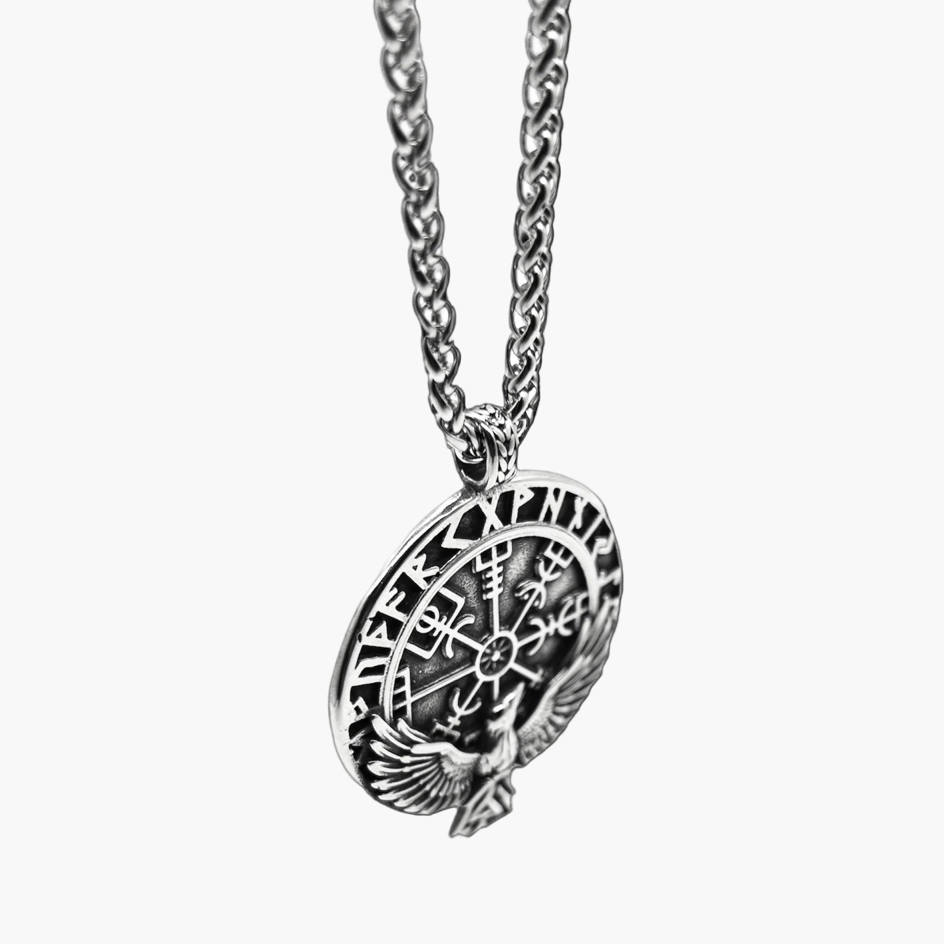 left angle view of Eagle of God pendant in 316L stainless steel