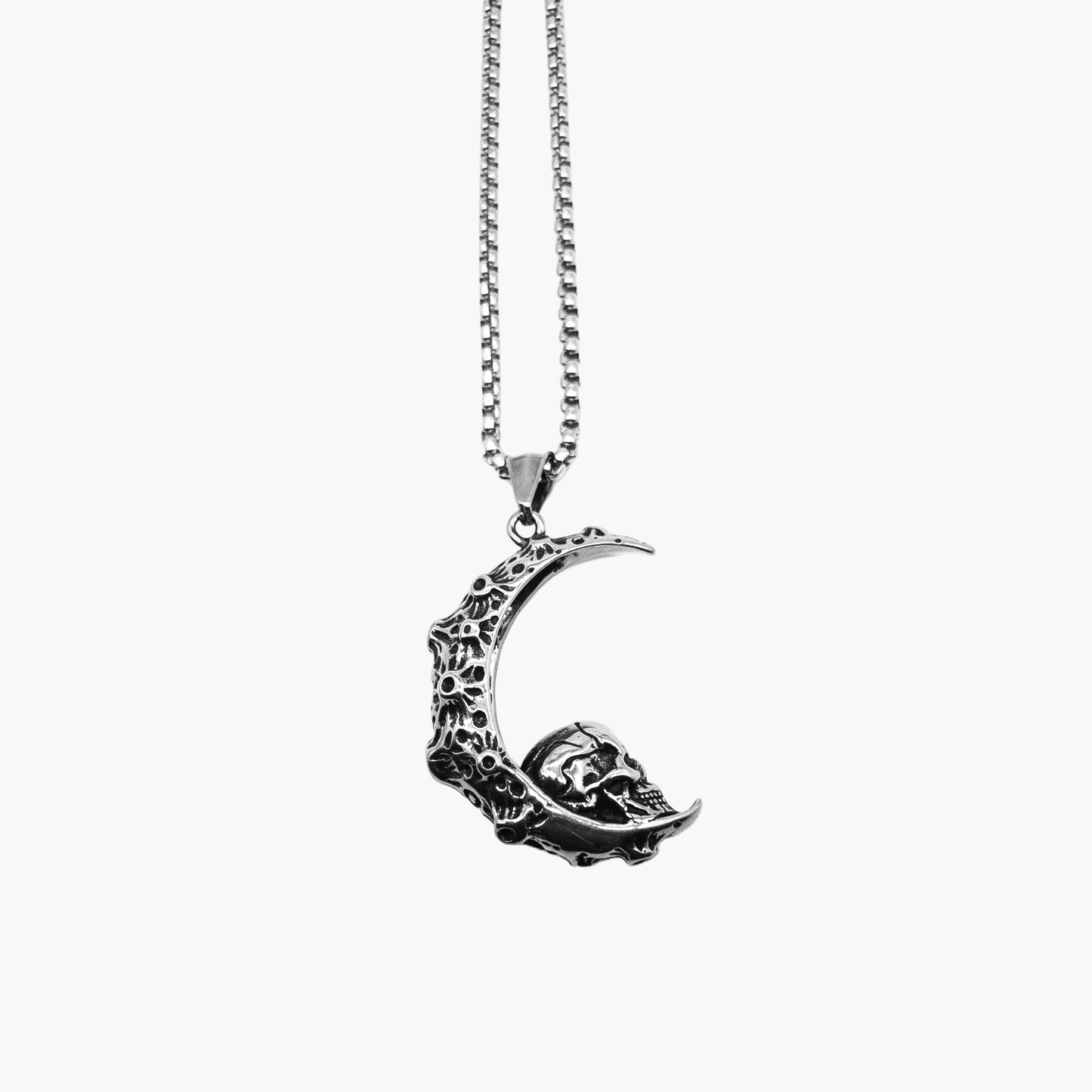 flat shot of Moonskull pendant in 316L stainless steel