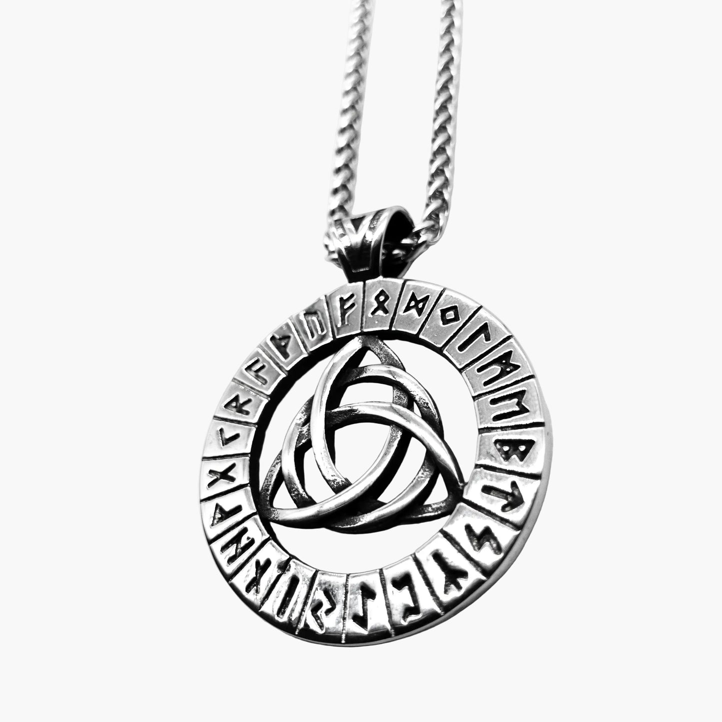 left close-up of Norse-Gael Necklace highlighting rune engraved Triquetra pendant and precise etchings