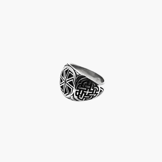 Left side view of Norse Wheel Ring highlighting engraved patterns along the band.