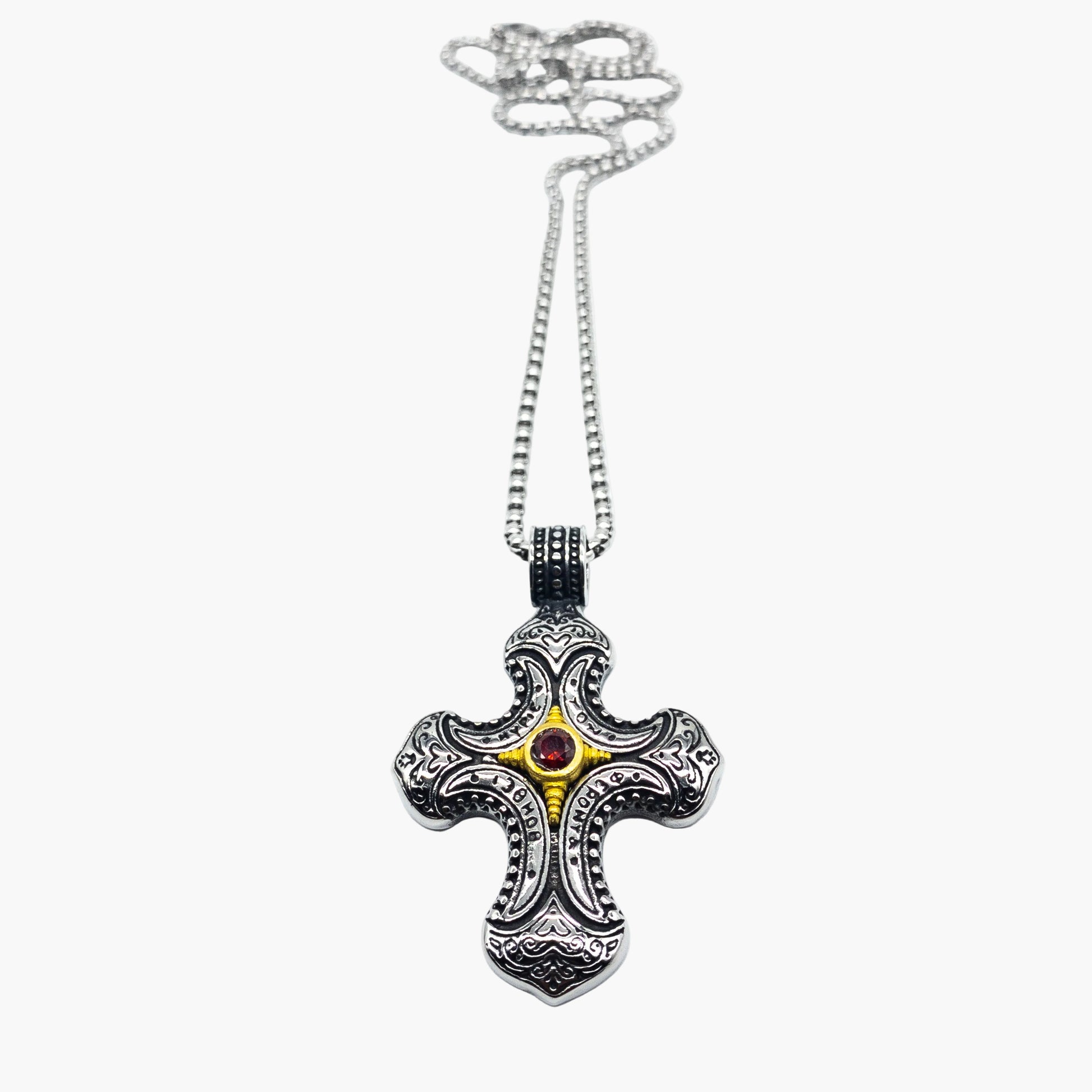 red gemstone centre detail on sculpted cross stainless steel pendant