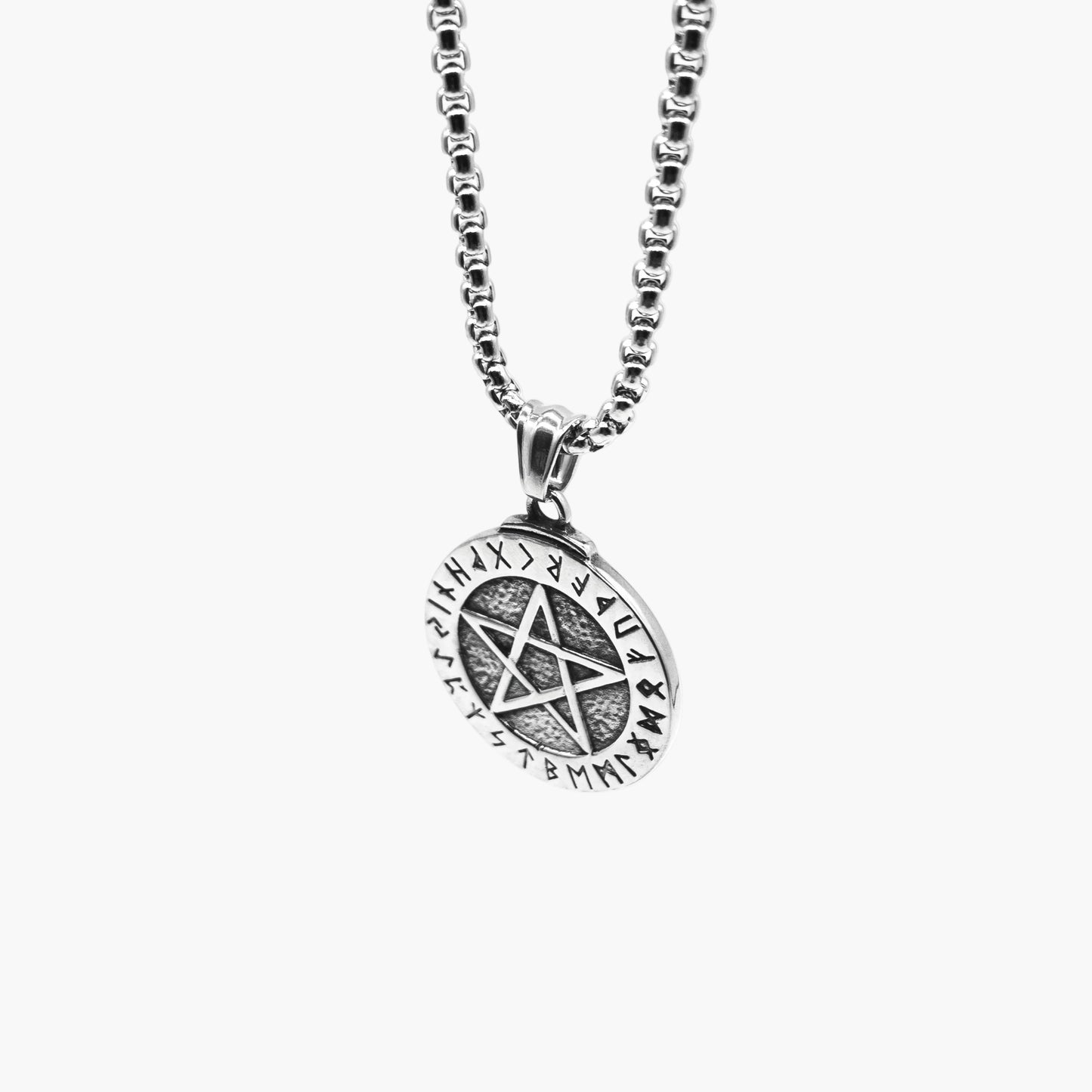right angle view of Runic Star pendant in 316L stainless steel