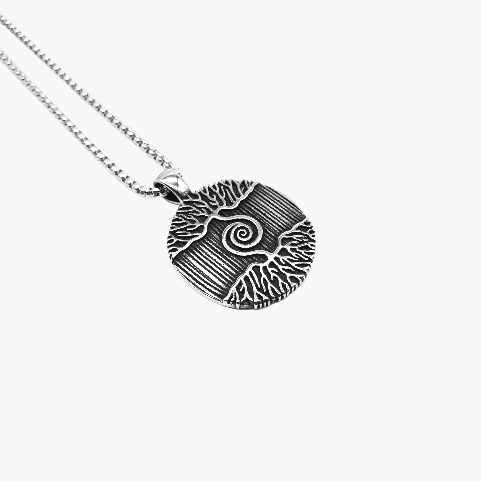 left angle view of Sacred Tree pendant in 316L stainless steel