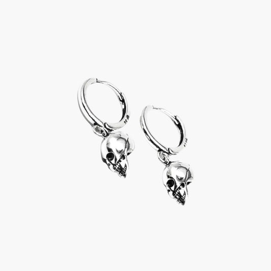 Silver skull hoop earrings by HOUSE OF ROK with sculpted skull motifs on smooth hoop