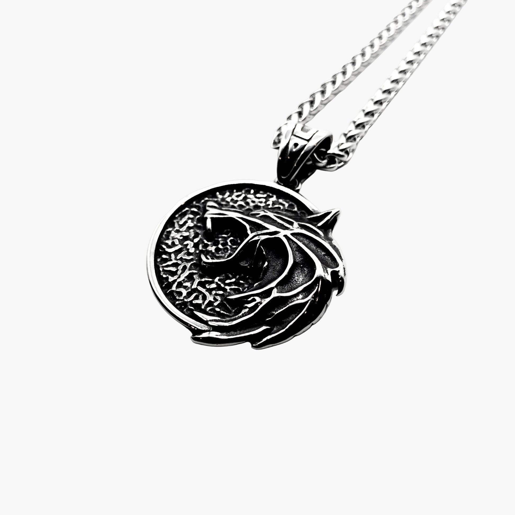 right angle view of Skoll Chain Norse wolf pendant with chain