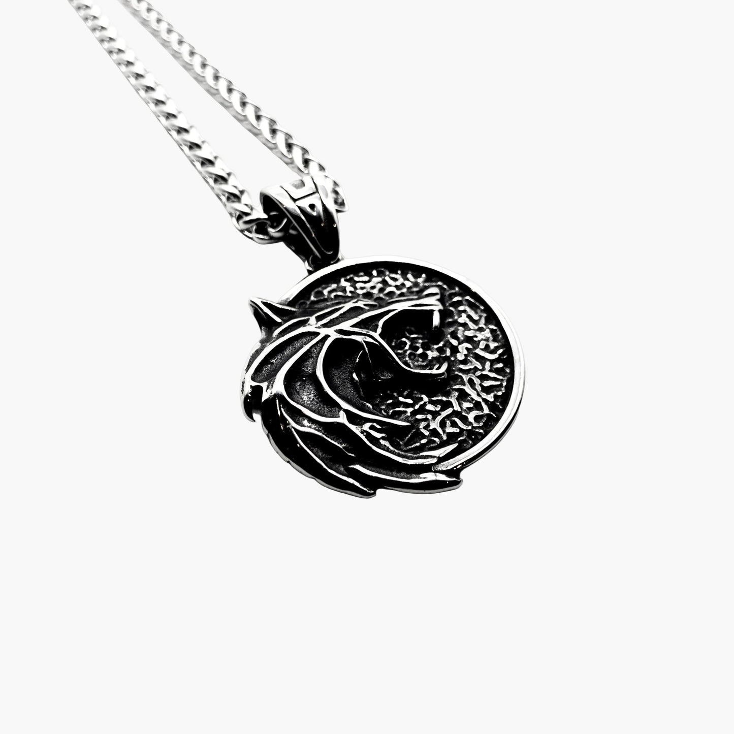 wolf head engraving detail on Skoll Chain stainless steel pendant