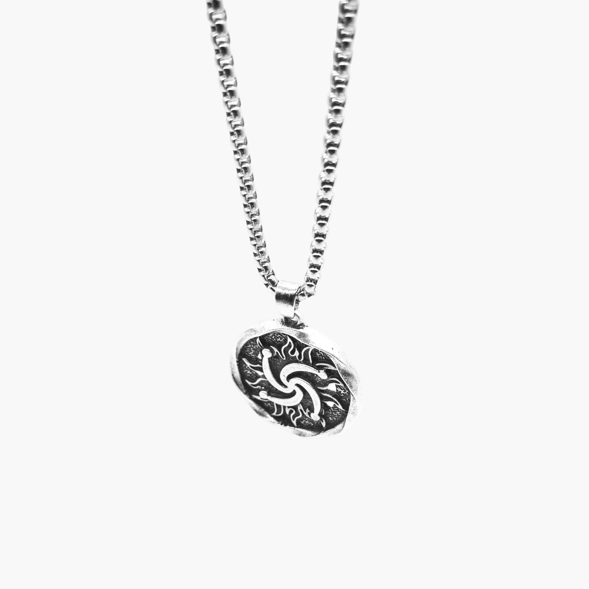 sun etching detail inspired by Norse goddess Sól on stainless steel pendant lift side shot