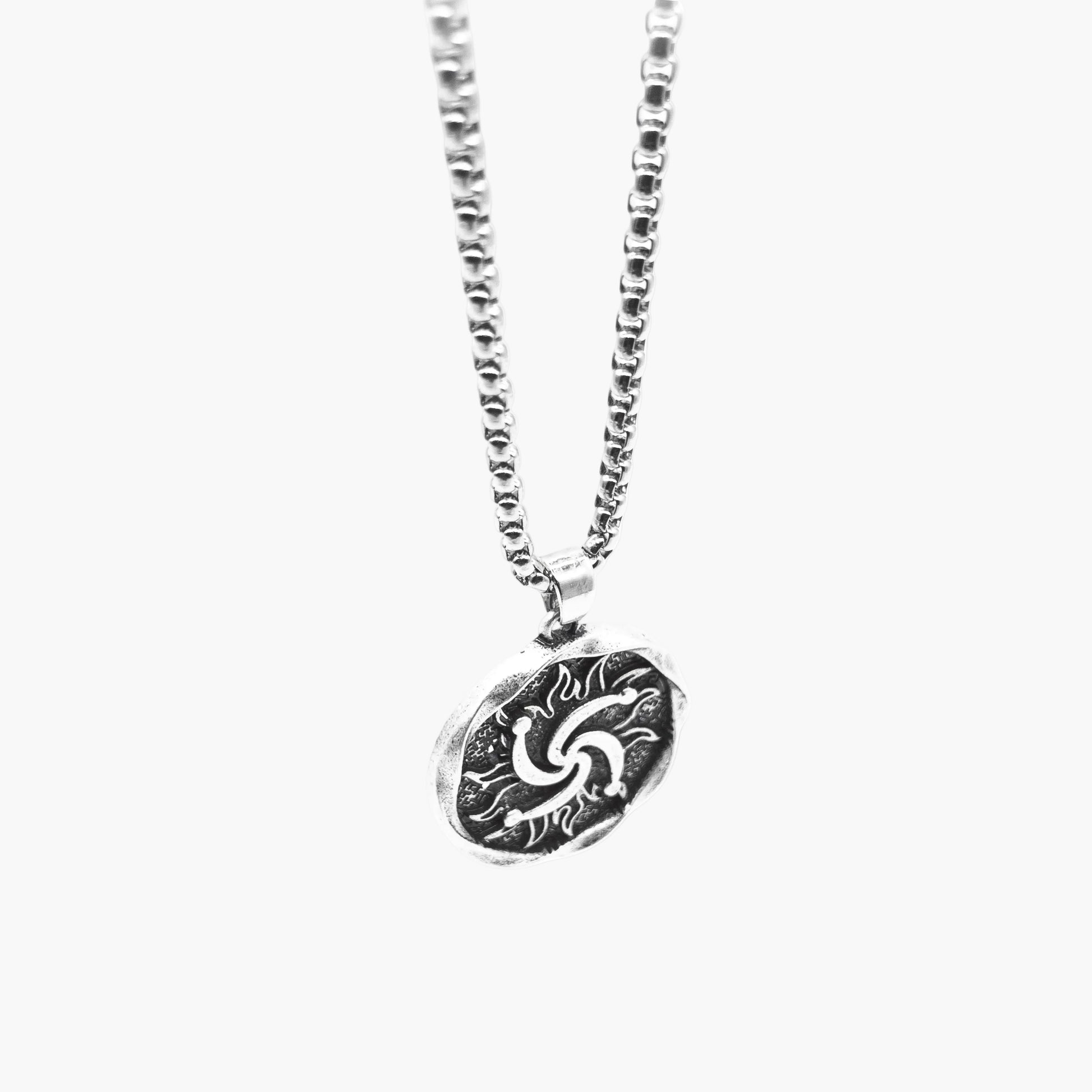 sun etching detail inspired by Norse goddess Sól on stainless steel pendant right side shot