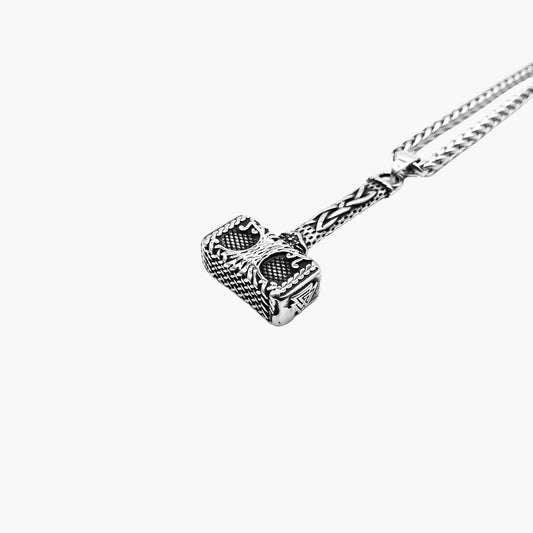 left angle view of Steel Hammer pendant in 316L stainless steel