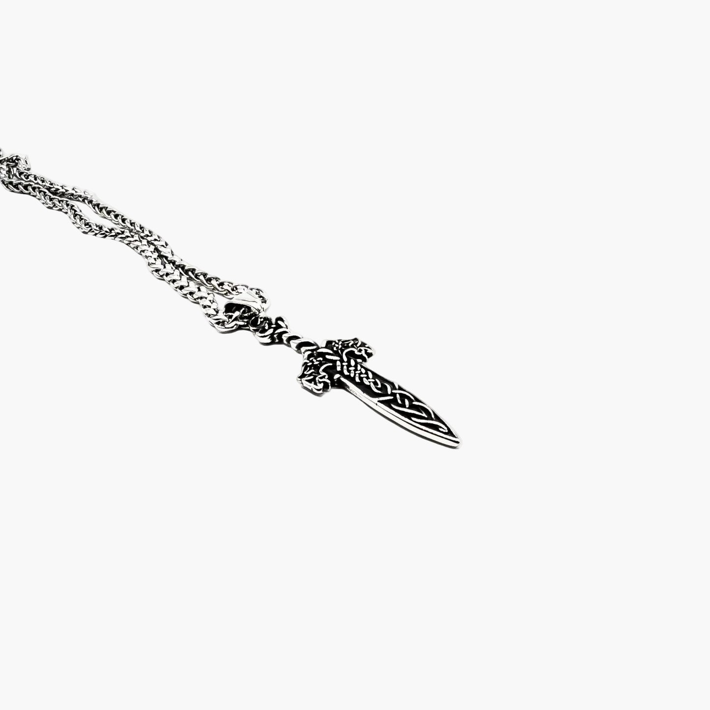 left angle view of Sword of God pendant in 316L stainless steel