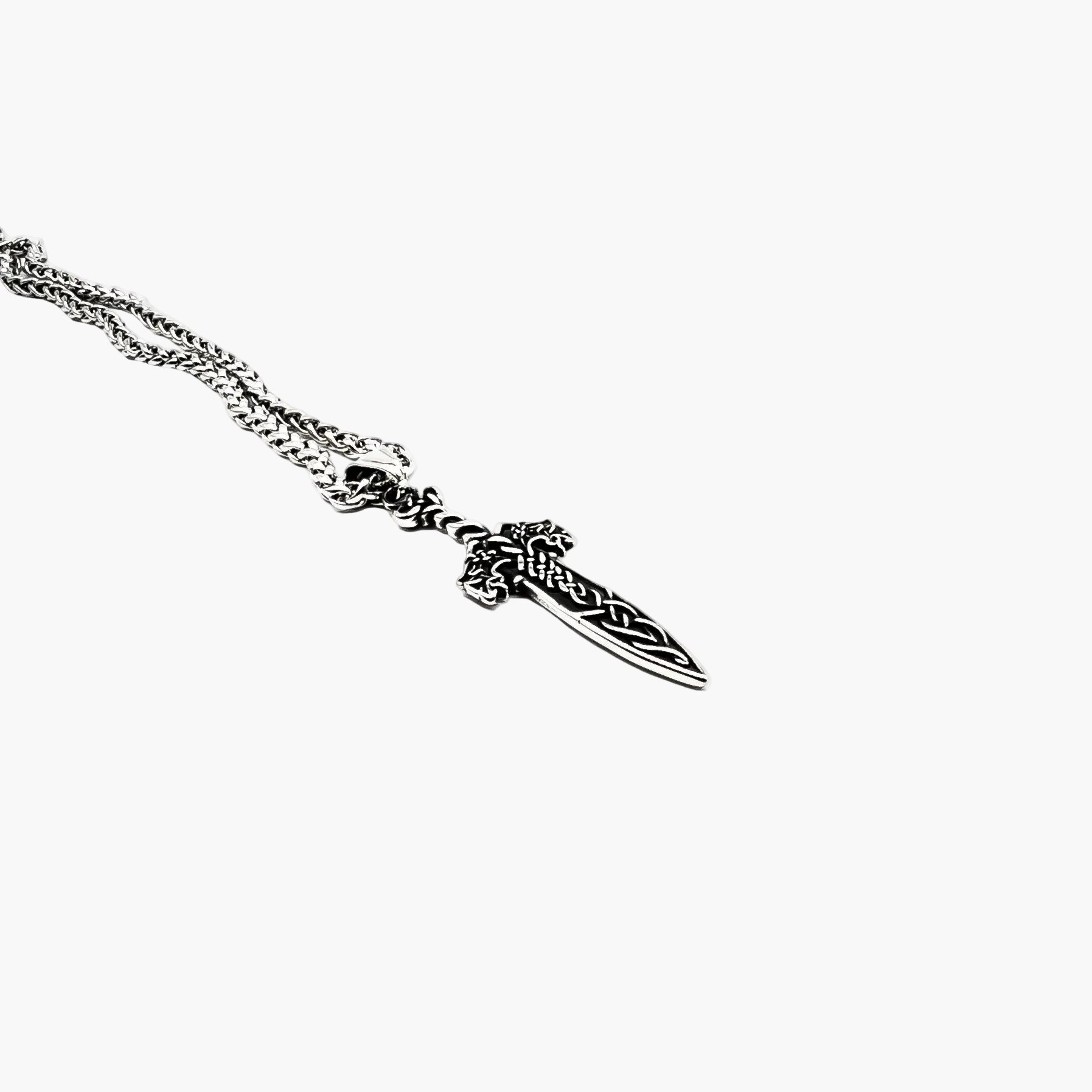 left angle view of Sword of God pendant in 316L stainless steel