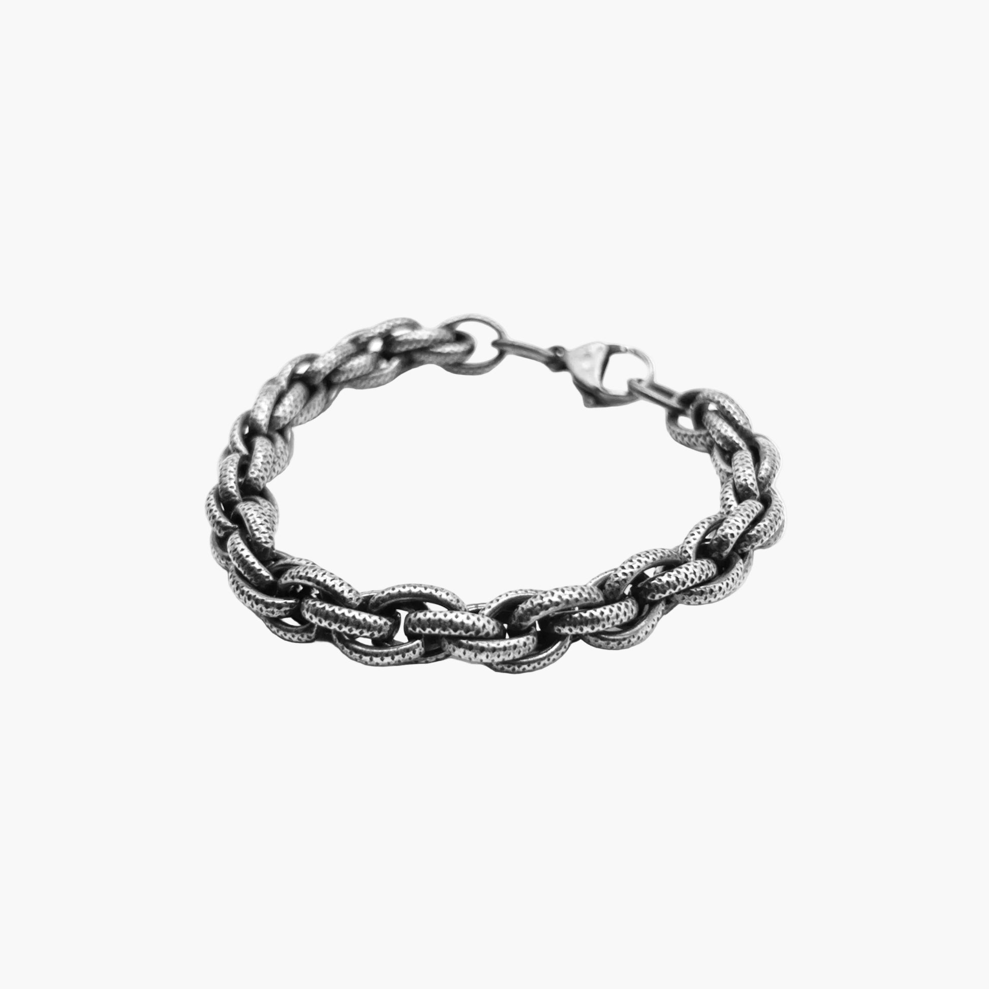 angled view of War Rebel Links polished silver link bracelet HOUSE OF ROK