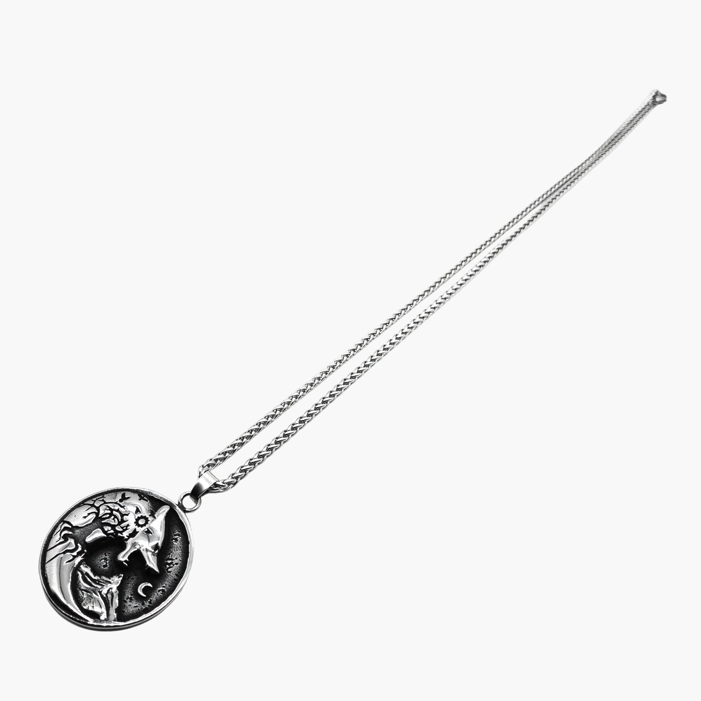 left angle view of Warg Chain Norse pendant showing engraving depth