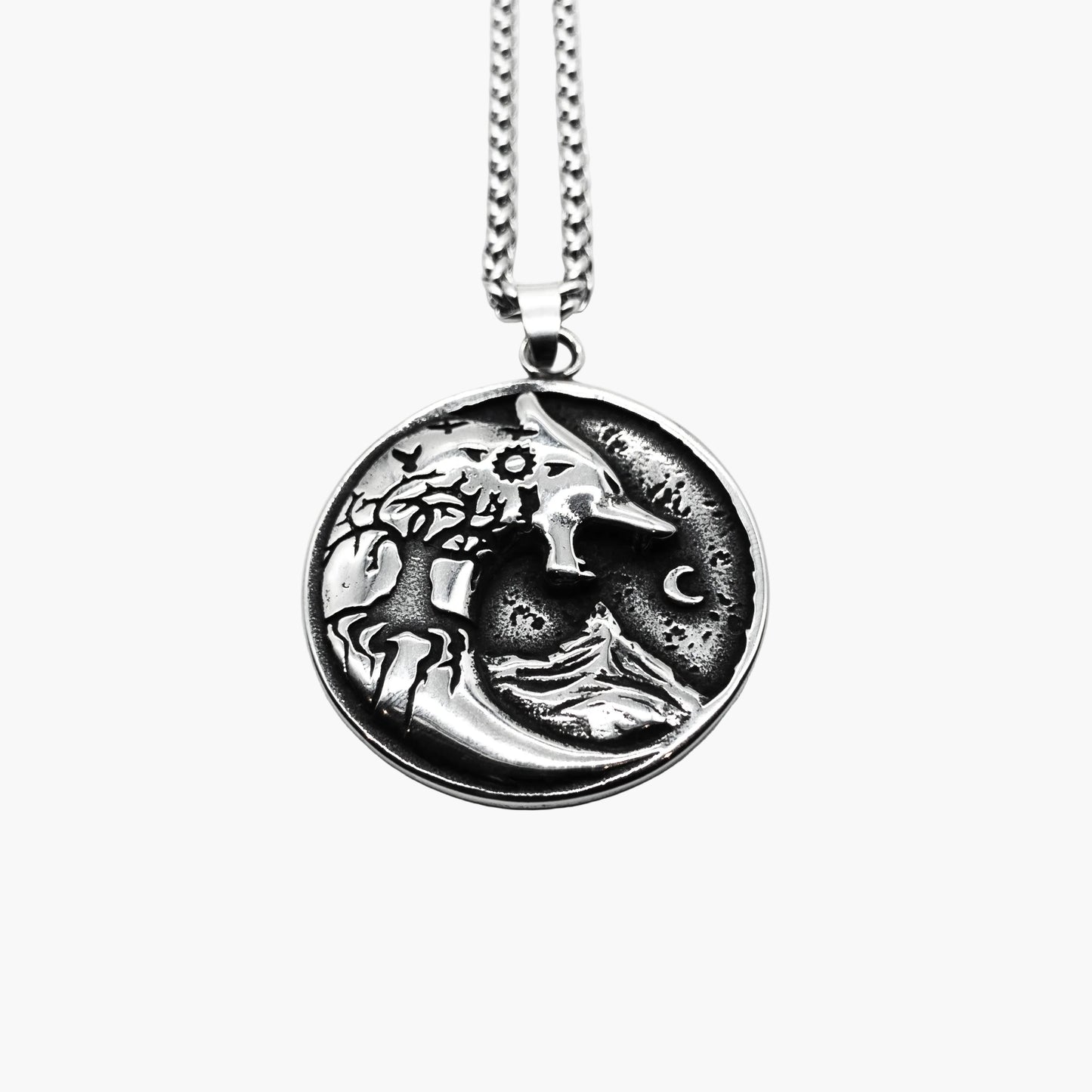 top down shot wolf and Yggdrasil branches with crescent moon engraving on Warg Chain pendant