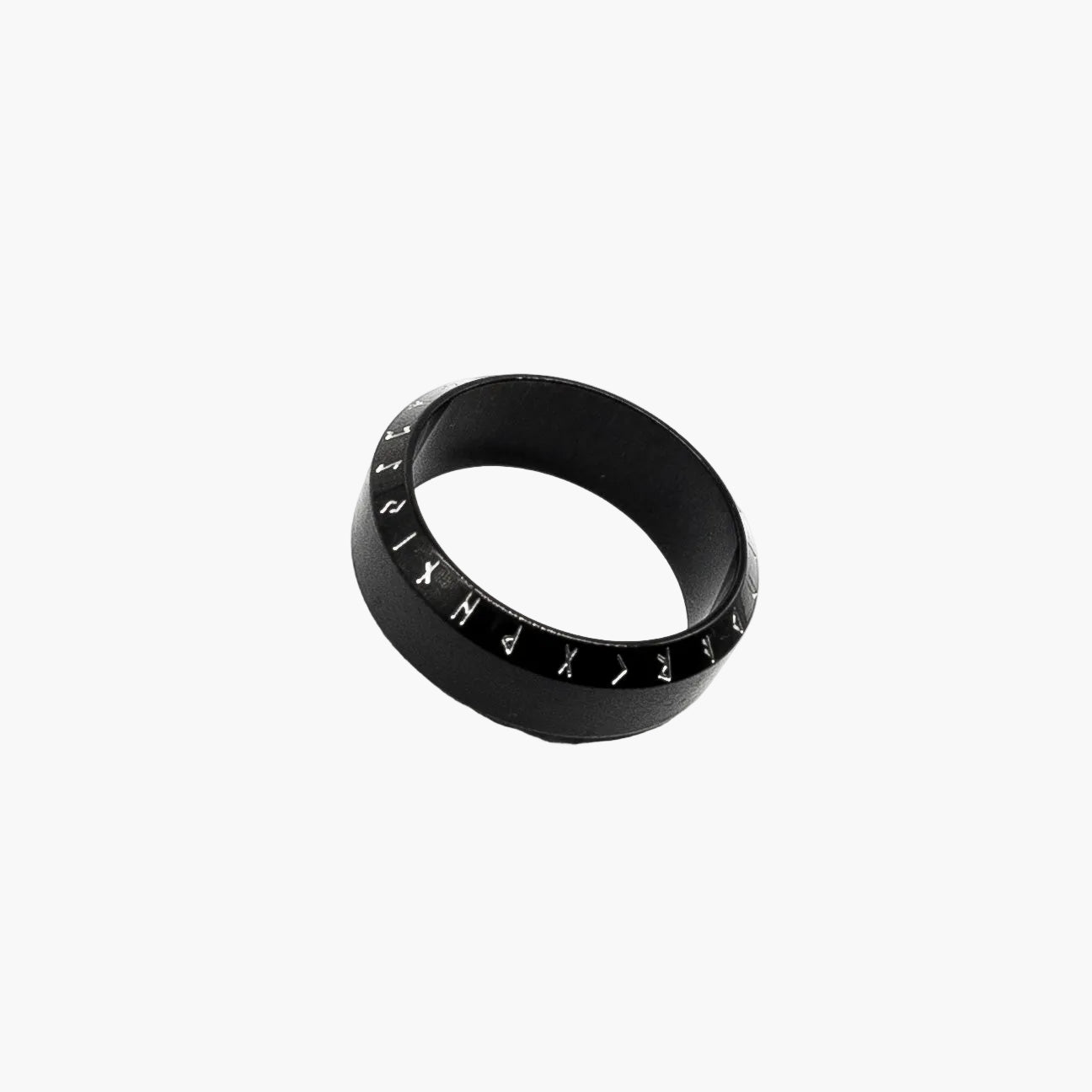 right angle view of White Runes black ring showing contrast engraving 
