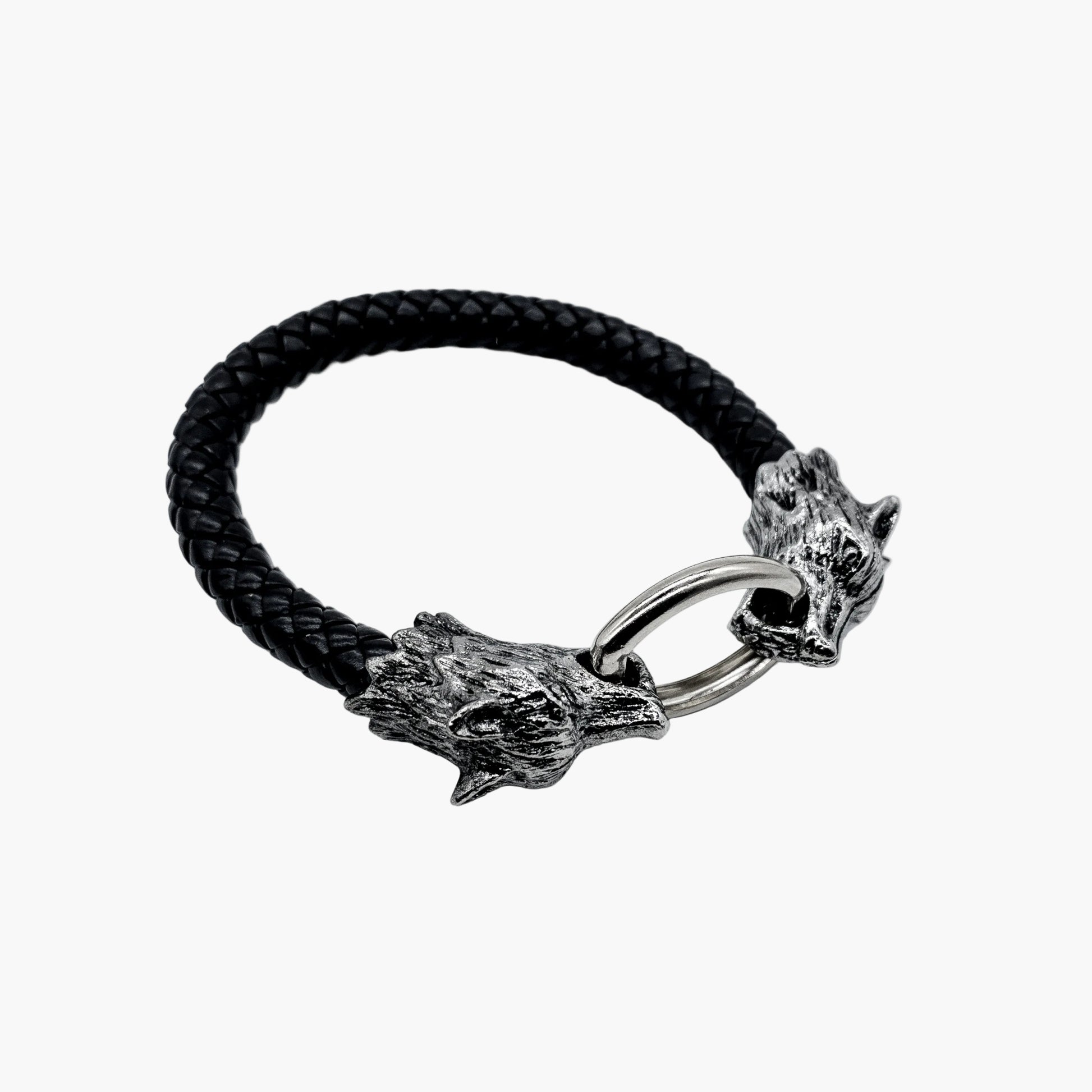 tilted flat view of Wolf Head leather and stainless steel bangle