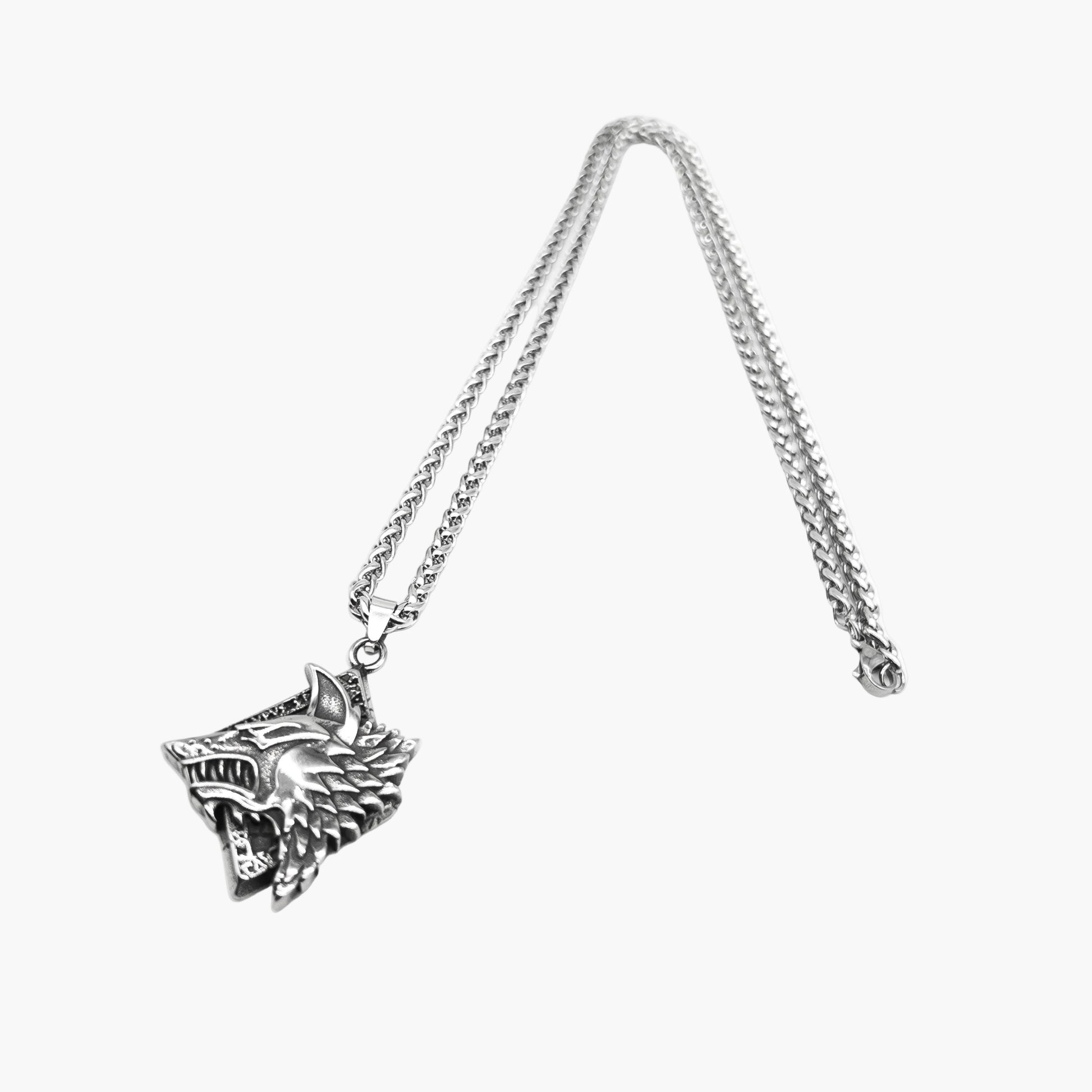 left angle view of Wolf of God pendant in 316L stainless steel